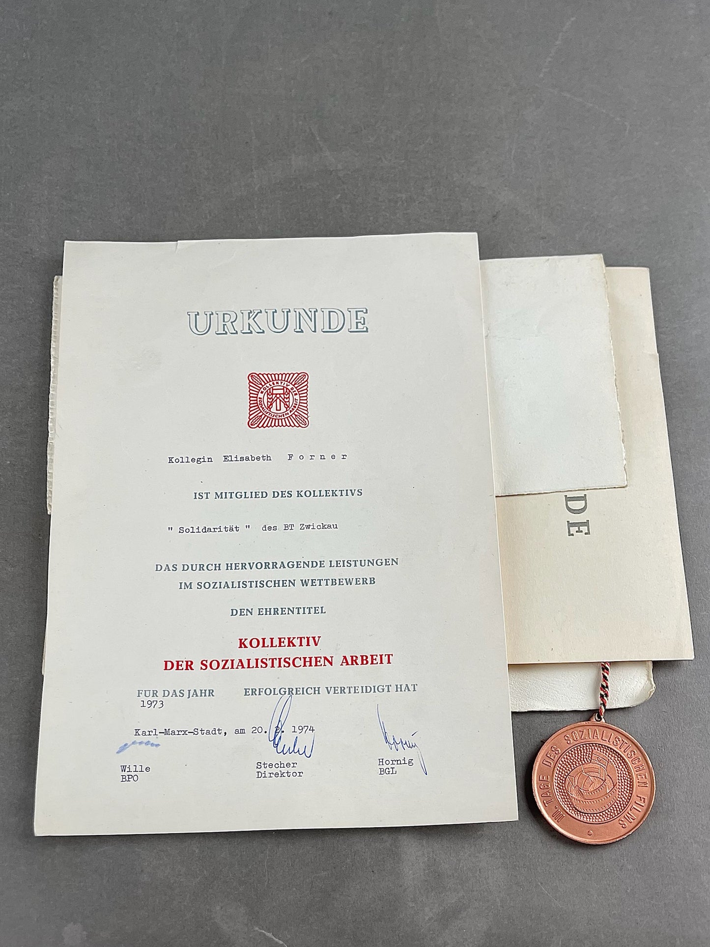 Østtysk DDR Urkunde/Medalje Lot. Original.