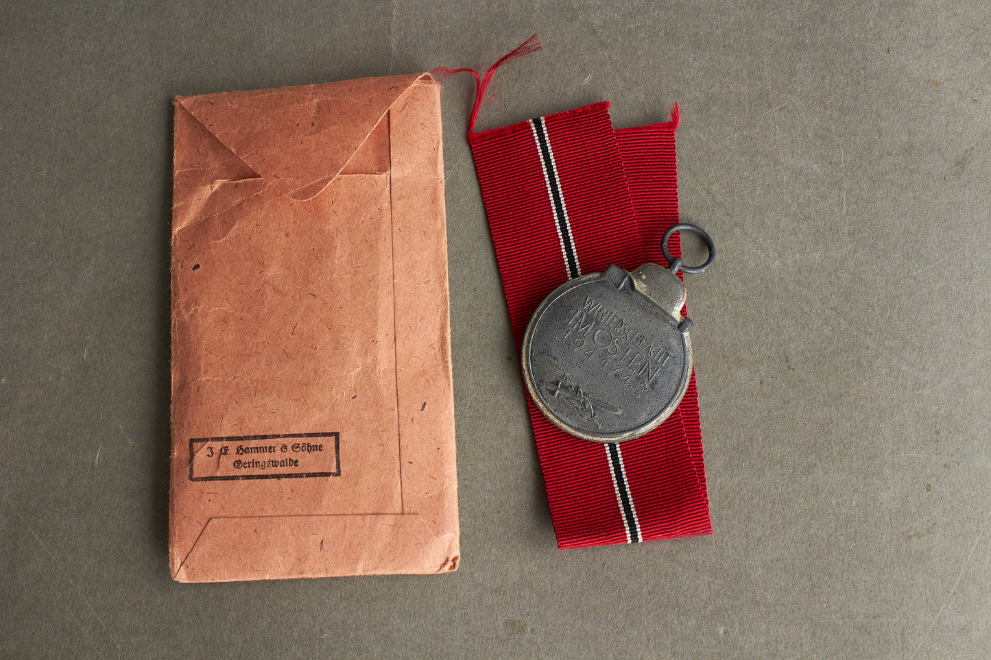 WW2 Tysk Østfront Medalje m. fremstiller og i pose. Original.