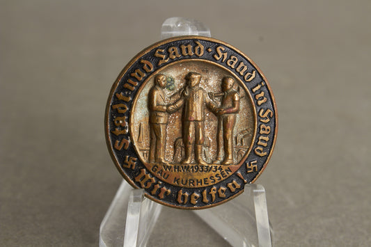 WW2 Tysk Tidlig 1933/34 WHW/NSDAP Tinnie. Original.