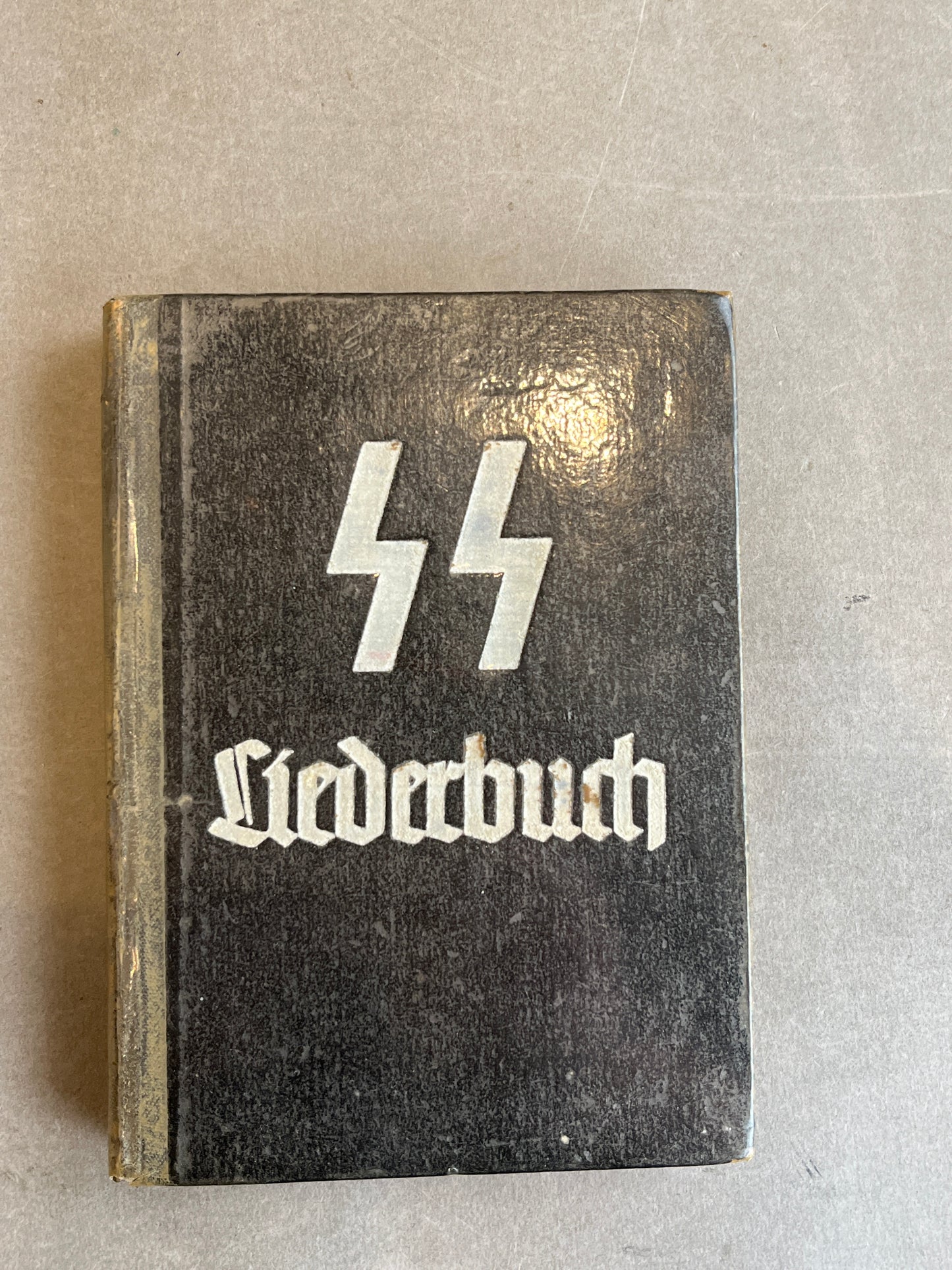 WW2 Tysk Waffen-SS "Liederbuch". Indbundet i beskyttende "bogplast". Original.