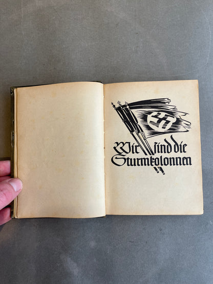 WW2 Tysk Waffen-SS "Liederbuch". Indbundet i beskyttende "bogplast". Original.