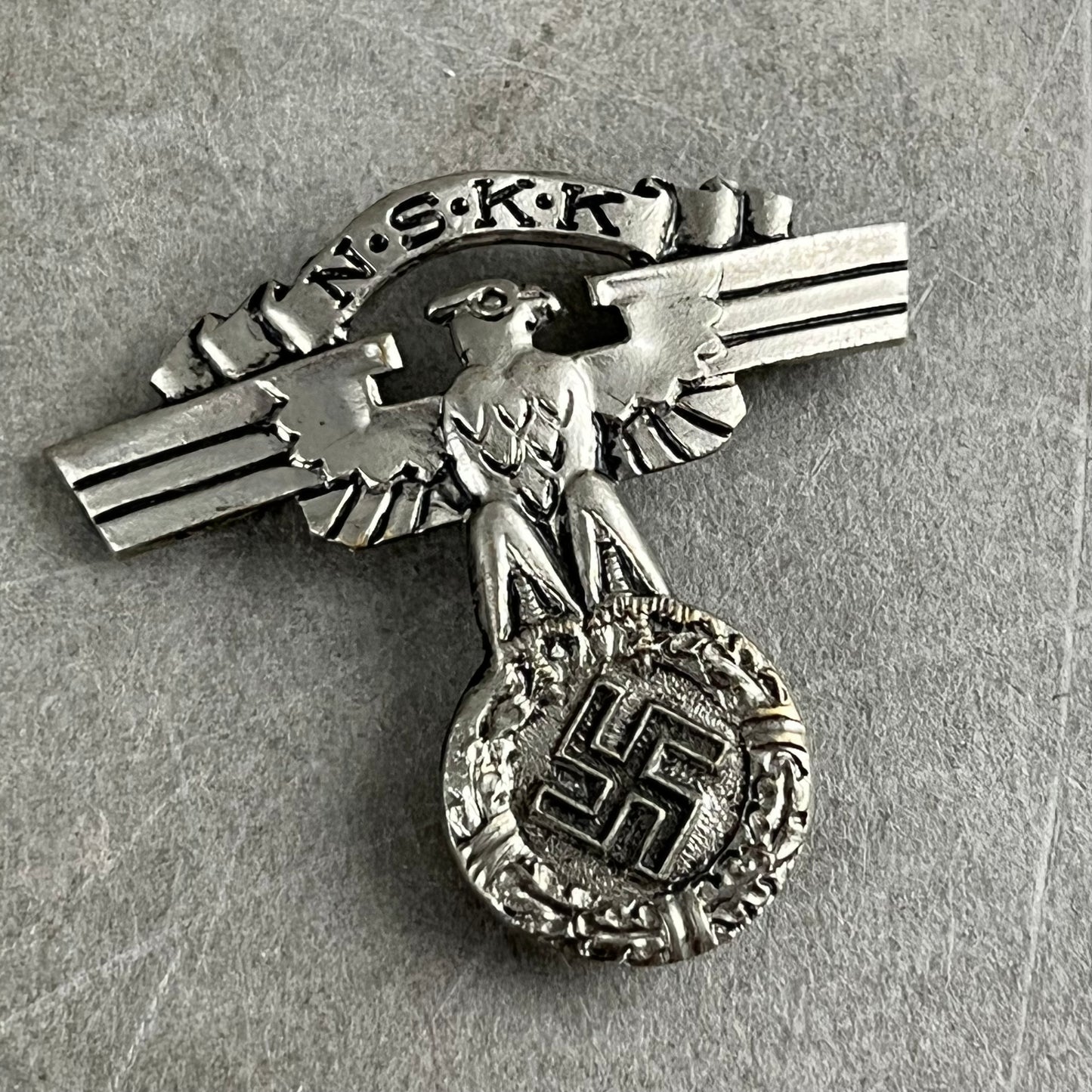 WW2 Tysk NSKK Kasketørn. Original.