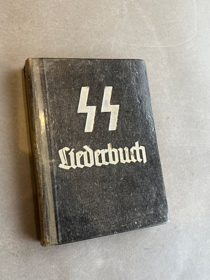 WW2 Tysk Waffen-SS "Liederbuch". Indbundet i beskyttende "bogplast". Original.