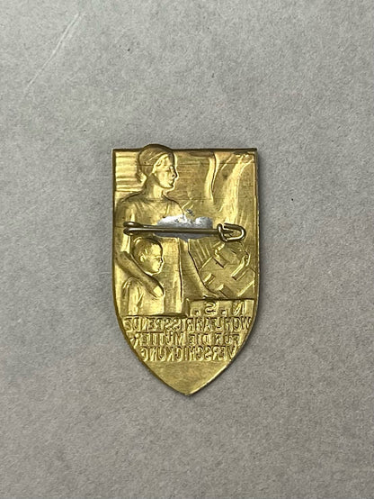 WW2 Tysk "Mutter und Kind" Tinnie. Sjælden. Original.