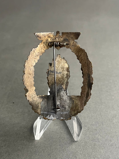 WW2 Tysk "Minensucher-Kriegsabzeichen" i Buntmetall. Nål og krog skiftet. Original.