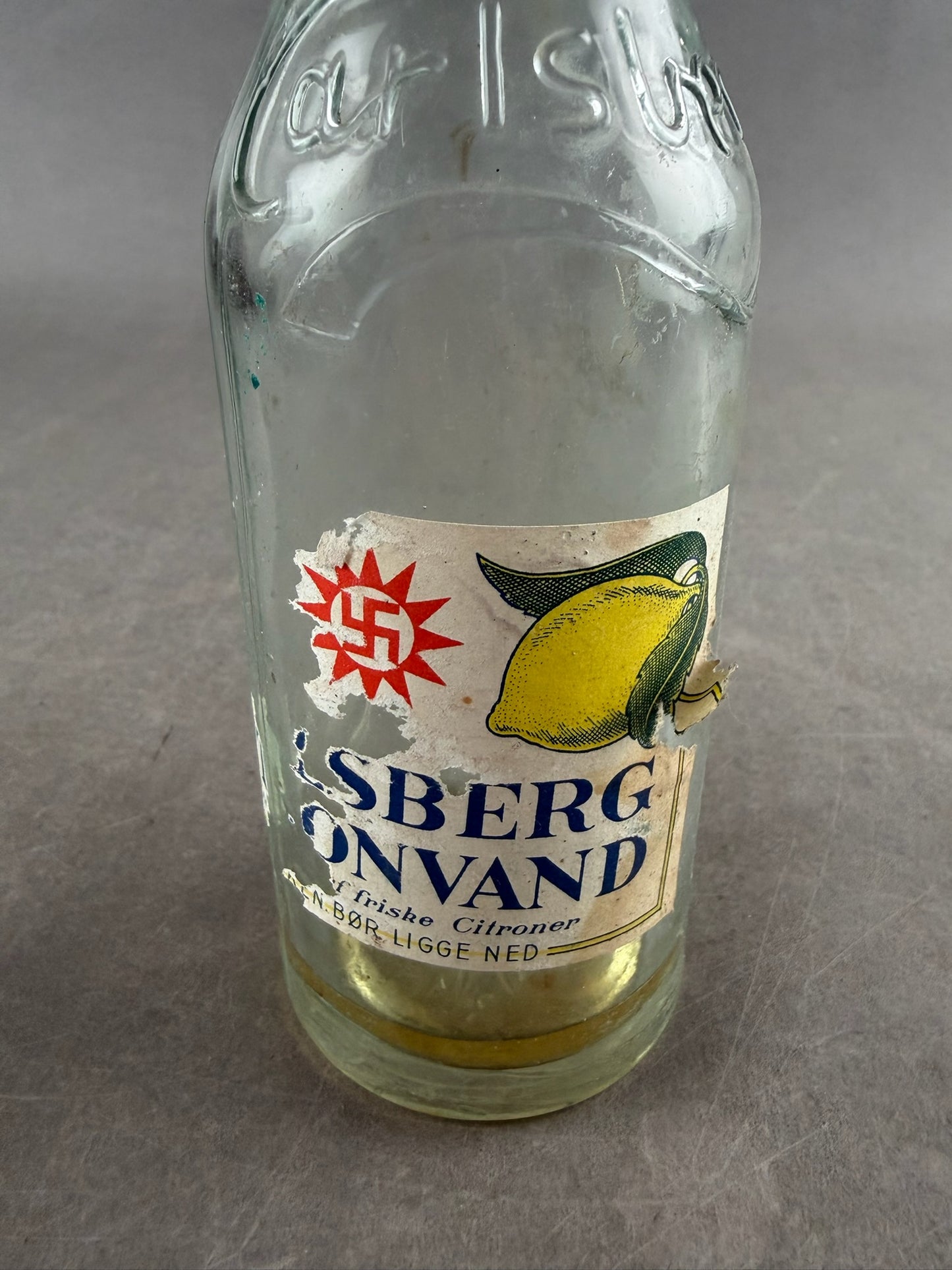 WW2 Dansk Carlsberg Flaske med Solhjul og etikette. Original.
