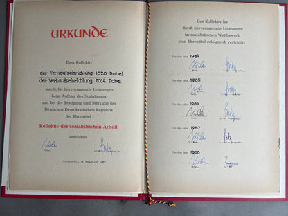 Østtysk DDR Urkunde Mappe med 2 Urkunder. Original.