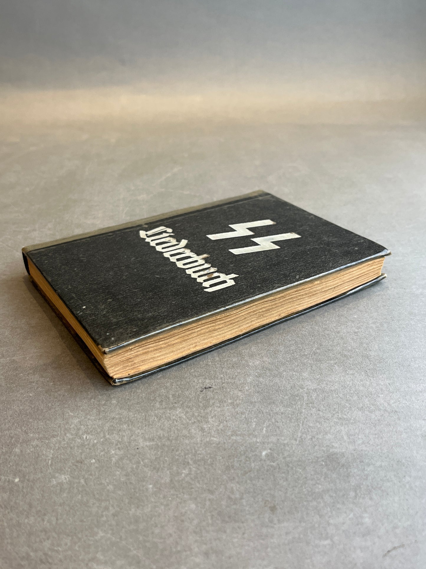 WW2 Tysk Waffen-SS "Liederbuch". Indbundet i beskyttende "bogplast". Original.