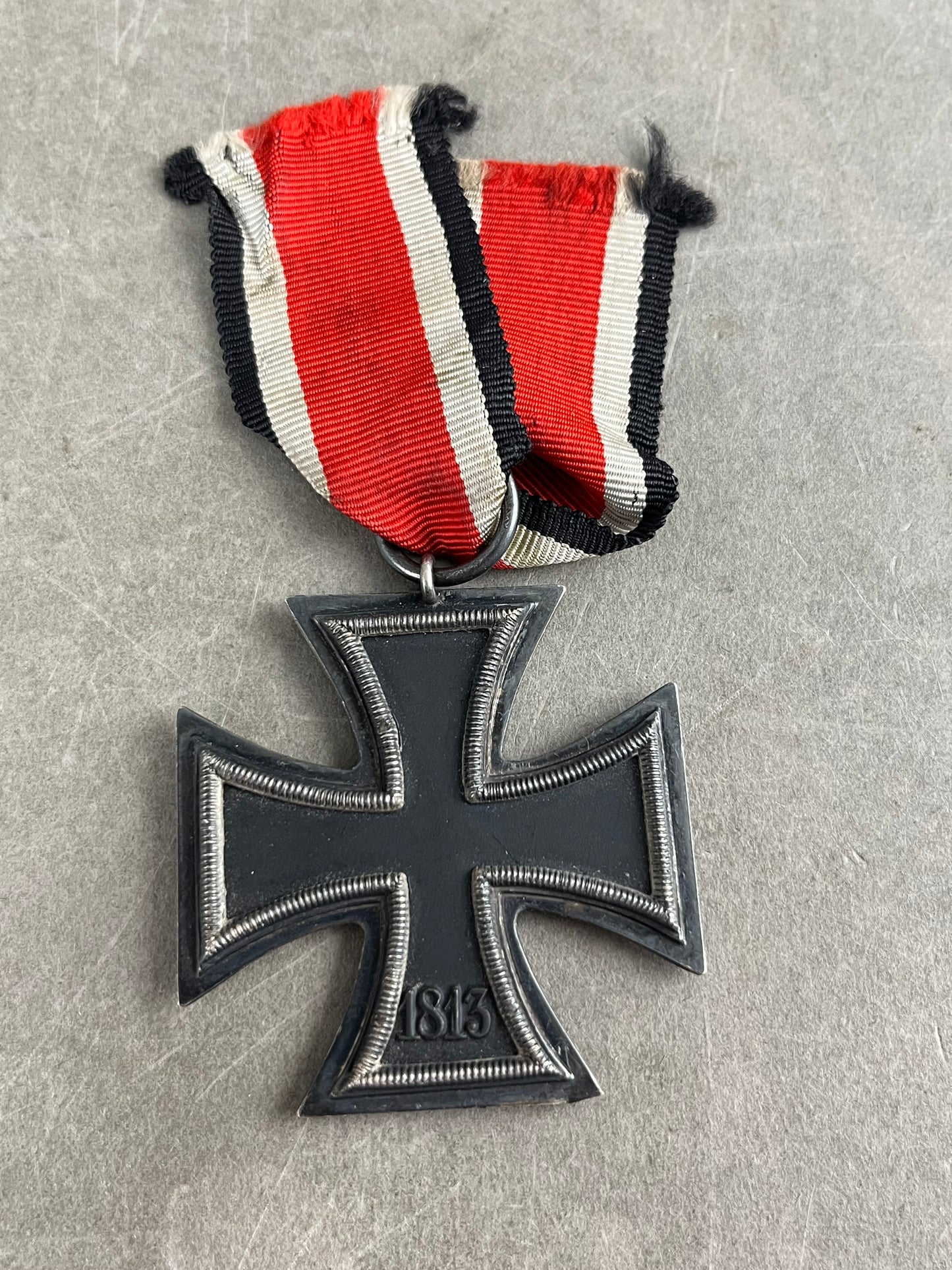 WW2 Tysk Jernkors 2. Klasse. Stemplet fremstiller "65" i ringen. Original.
