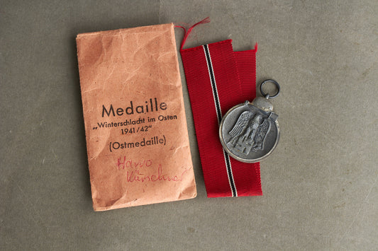 WW2 Tysk Østfront Medalje m. fremstiller og i pose. Original.