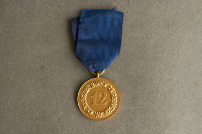 WW2 Tysk "12 års tro tjeneste" Medalje. Original.
