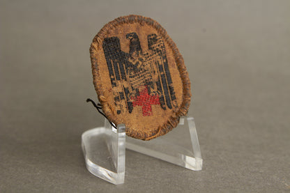 WW2 Tysk DRK (Deutsches Rotes Kreuz) Skråhue Mærke. Original.