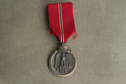 WW2 Tysk Østfront Medalje. Fremstiller 6 i ringen. Original.