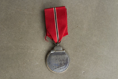 WW2 Tysk Østfront Medalje. Fremstiller 6 i ringen. Original.