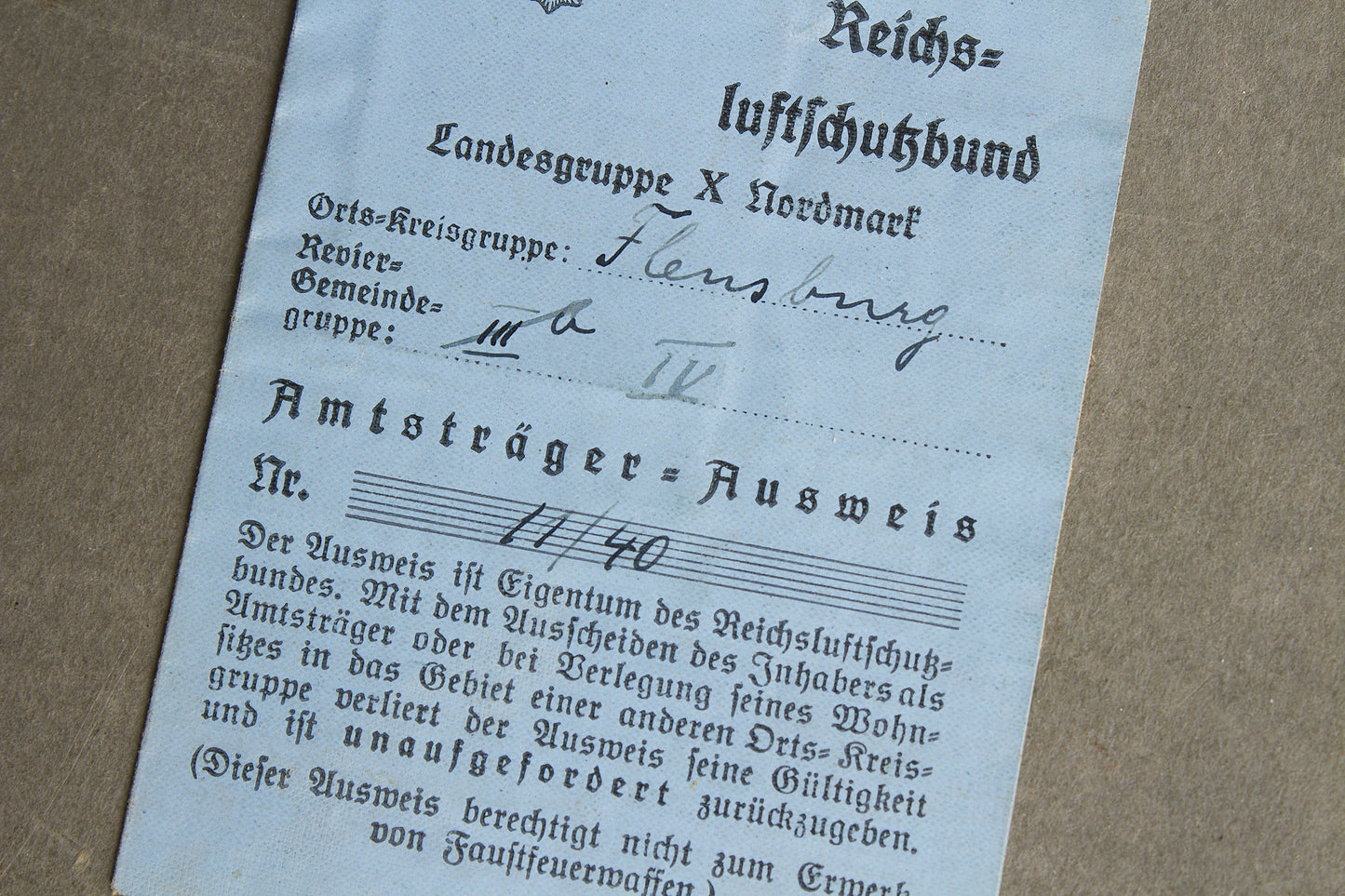 WW2 Tysk Reichs Luftschutzbund "Ausweis" fra Flensborg. Original.