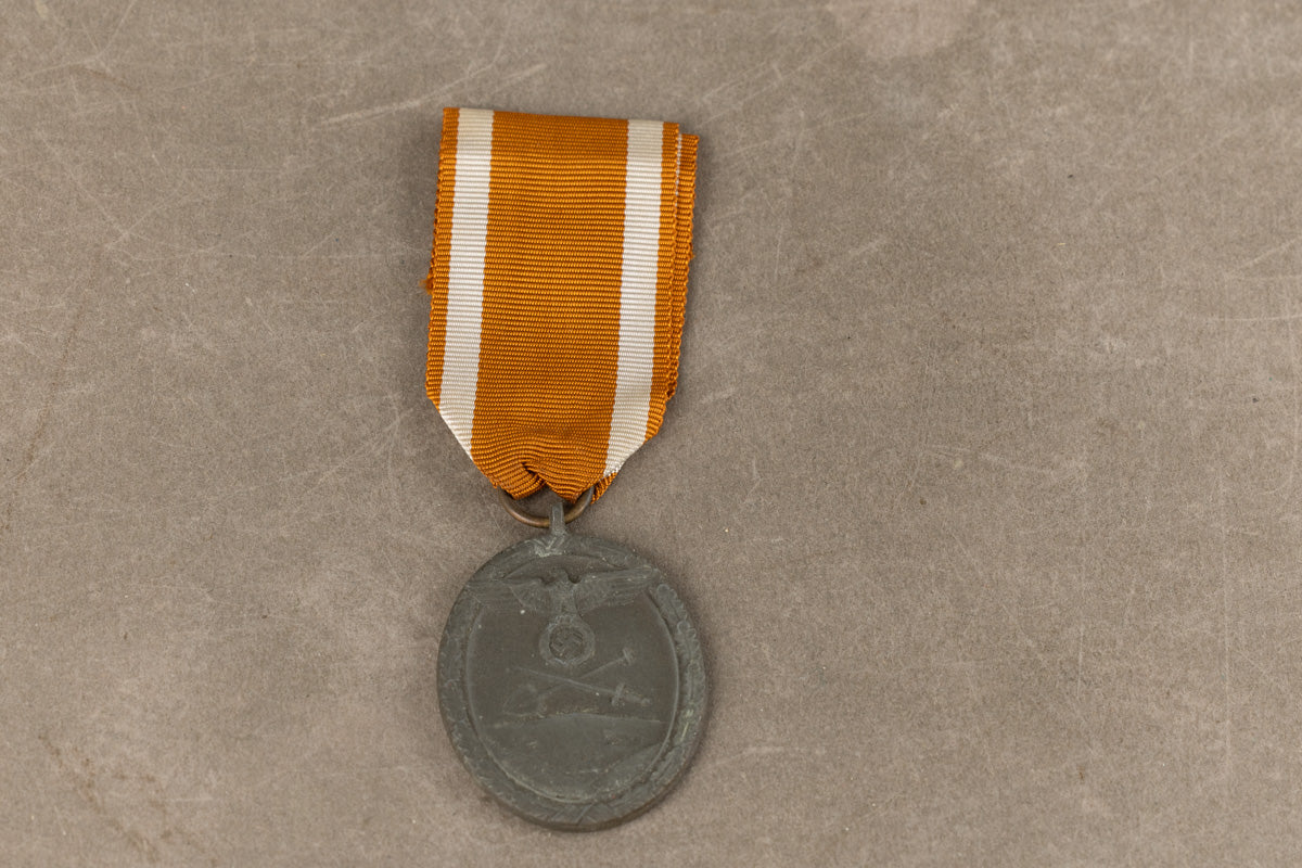 WW2 Tysk "Deutsches Schutzwallehrenzeichen". Original.