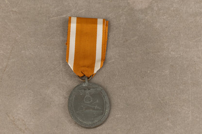 WW2 Tysk "Deutsches Schutzwallehrenzeichen". Original.