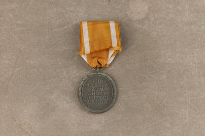 WW2 Tysk "Deutsches Schutzwallehrenzeichen". Original.