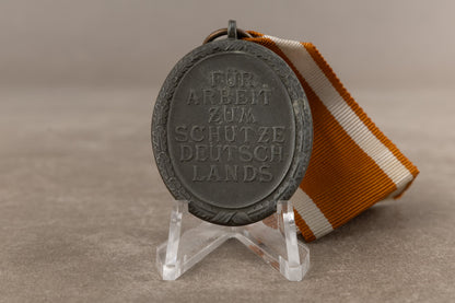 WW2 Tysk "Deutsches Schutzwallehrenzeichen". Original.