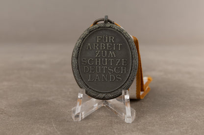WW2 Tysk "Deutsches Schutzwallehrenzeichen". Original.